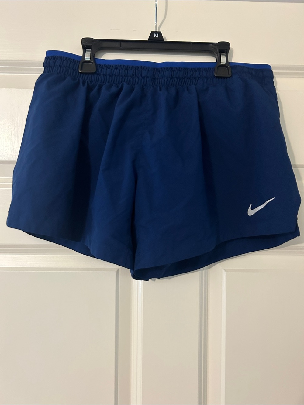 Nike Women's Royal Blue Athletic Running Shorts with White Swoosh